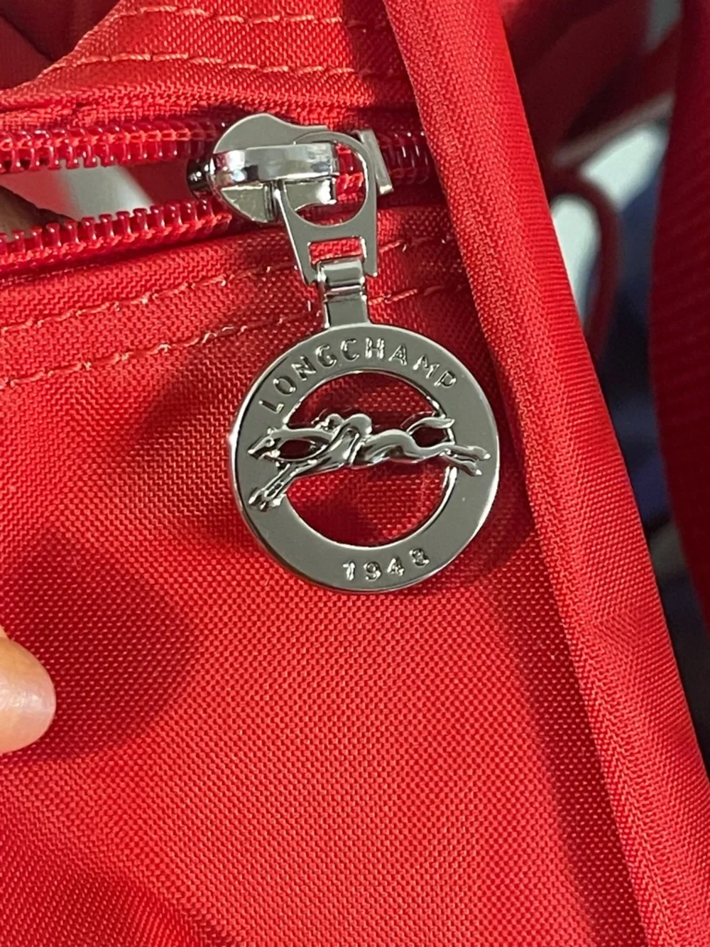 Longchamp Red Nylon Small Backpack with Silver Horse Emblem